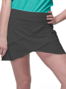 A woman wearing a petal-shaped skort with layered fabric.